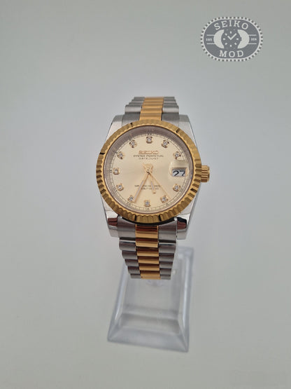 Datejust mod with gold diamond dial and two-tone bracelet