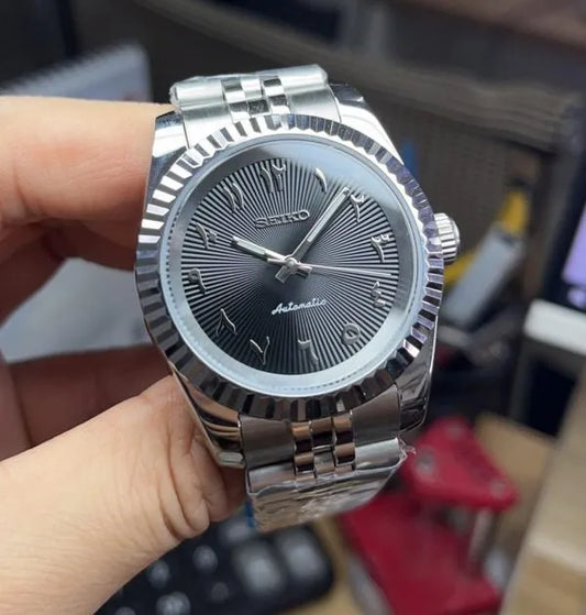 Datejust mod med grå räfflad arabic urtavla och Jubilee-armband