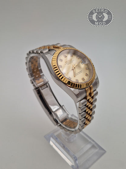 Datejust mod with gold diamond dial and two-tone bracelet