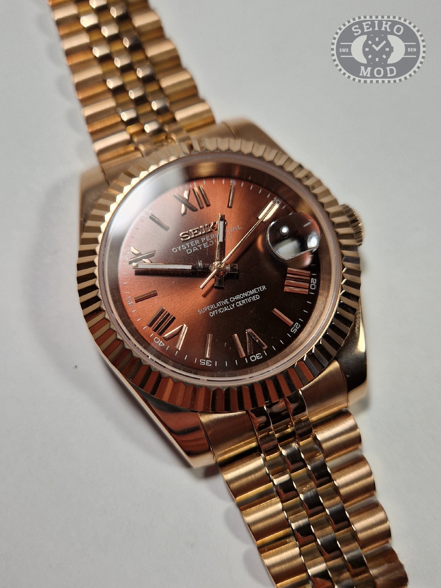 Datejust mod med choklad romersk urtavla och roséguld-armband