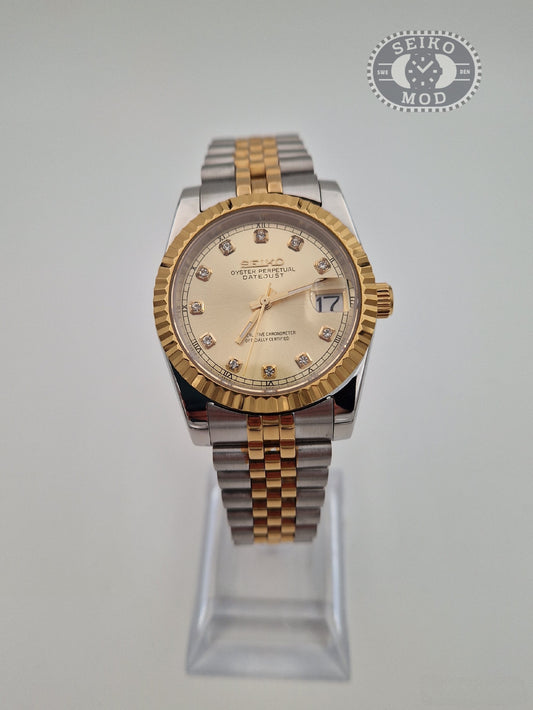 Datejust mod with gold diamond dial and two-tone bracelet